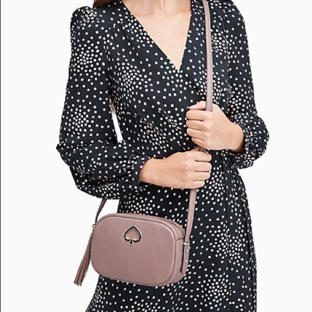Kate Spade Kourtney Camera Bag in dusk city scape